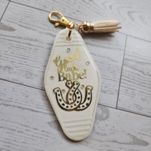 Good Luck Babe Keychain: Chic White Gold Design - Cream Tassel