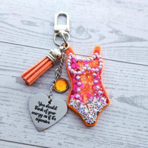 Orange Showgirl Era Keychain – Rhinestone Resin Bag Charm with Engraved Quote